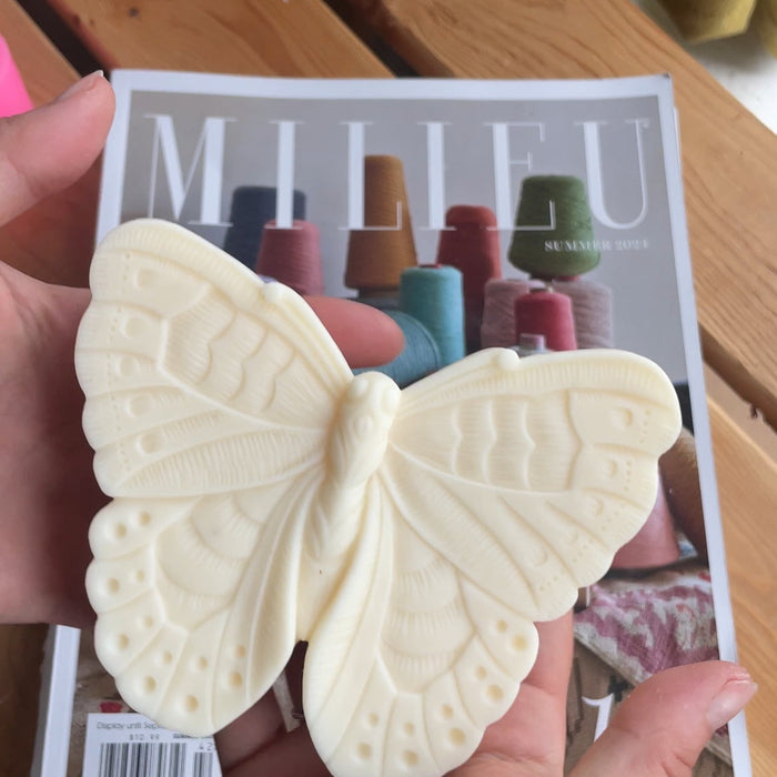 BOUGIE EN FORME DE PAPILLON